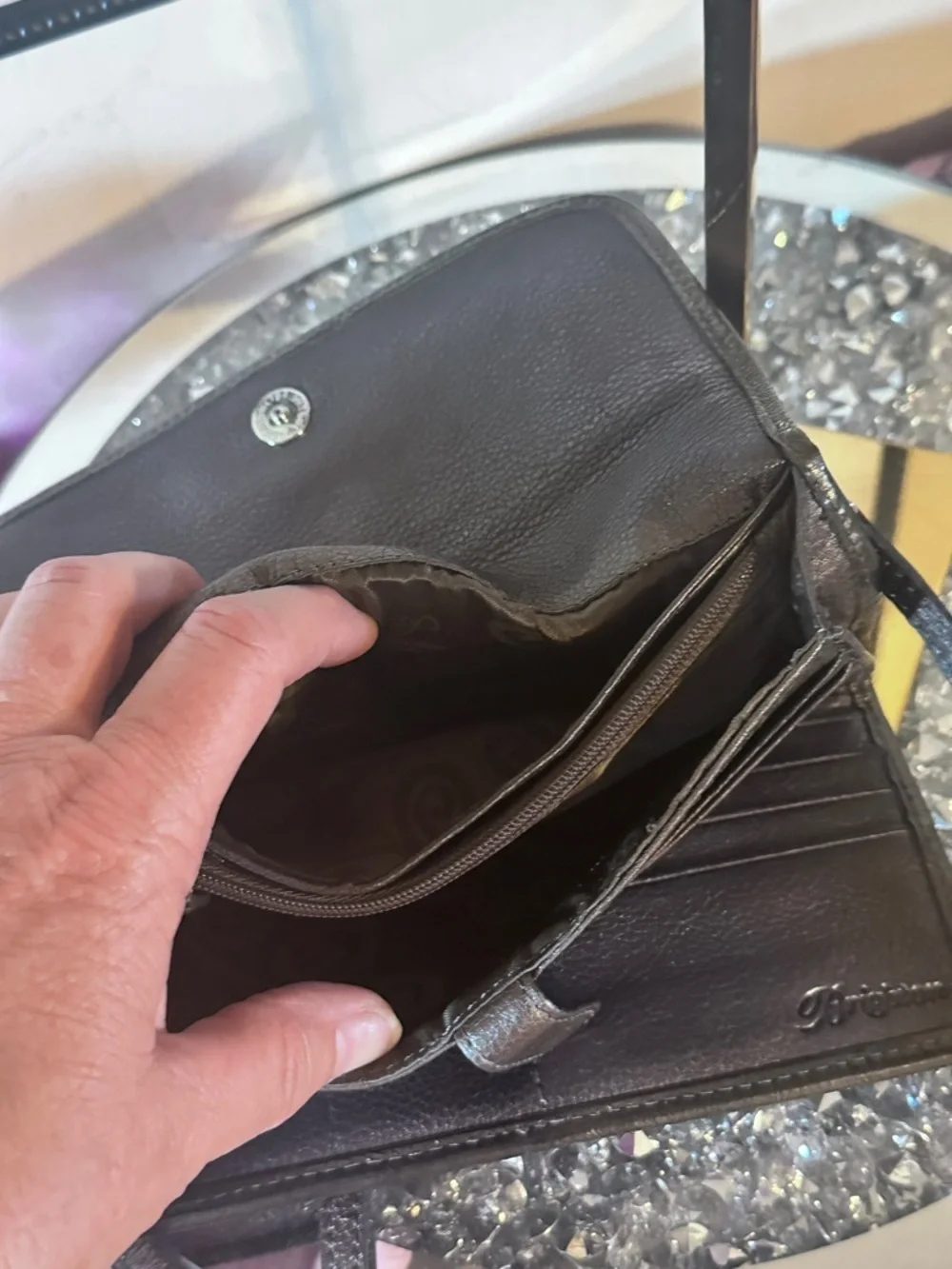 EUC metallic leather crossbody organizer by Brighton.
